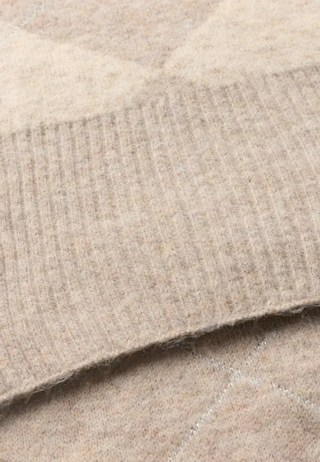 Longue écharpe à motif Argyle barley beige mel. Longue écharpe à motif Argyle barley beige mel.