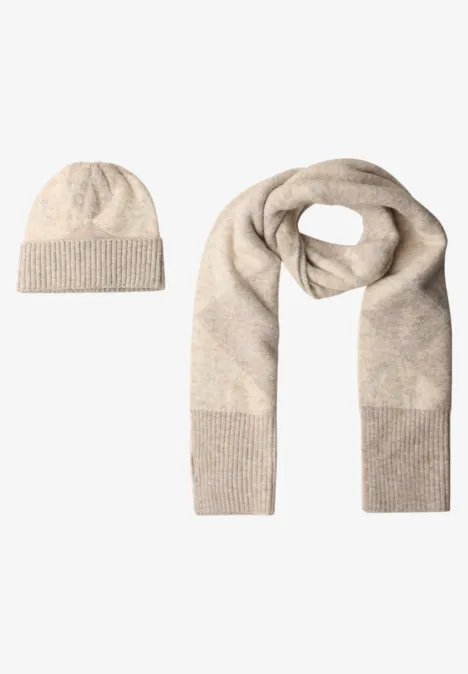 Longue écharpe à motif Argyle barley beige mel. Longue écharpe à motif Argyle barley beige mel.