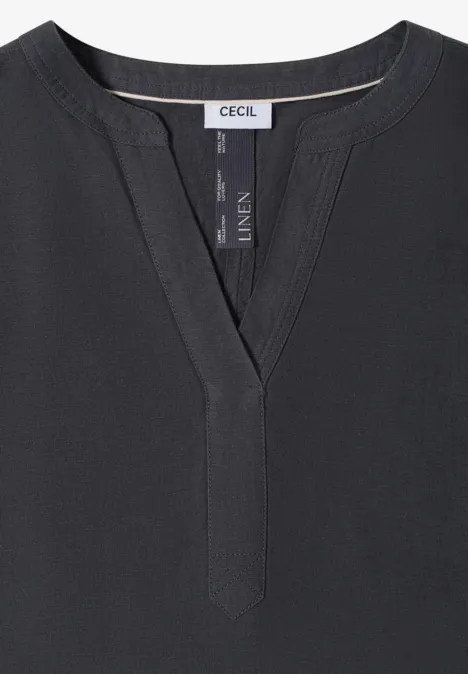 Schwarzes Leinen-Tunika-Oberteil mit V-Ausschnitt und hohem Kragenansatz.