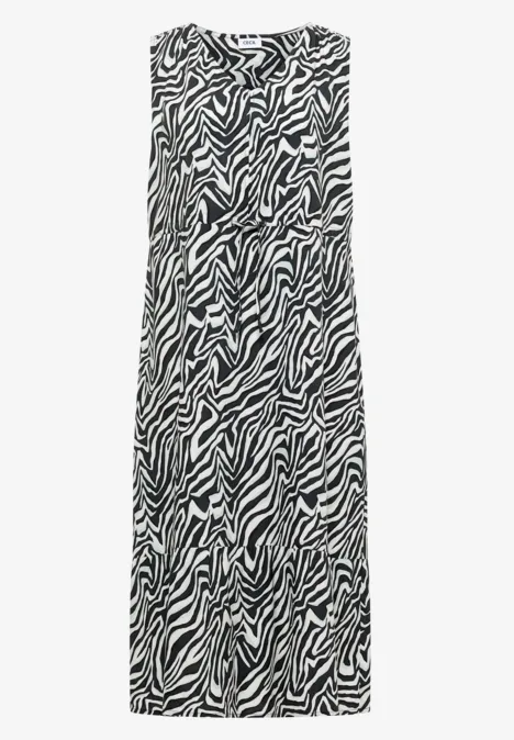 Ärmelloses, bodenlanges Kleid mit schwarz-weißem Zebra-Muster.