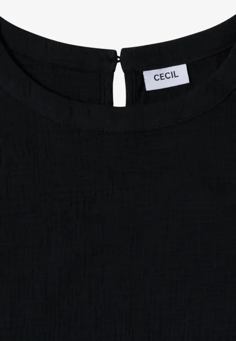 Zwart, gestructureerd bovenstuk met ronde hals, knoopsluiting achter en merketiket ‘CECIL’ in de nek.