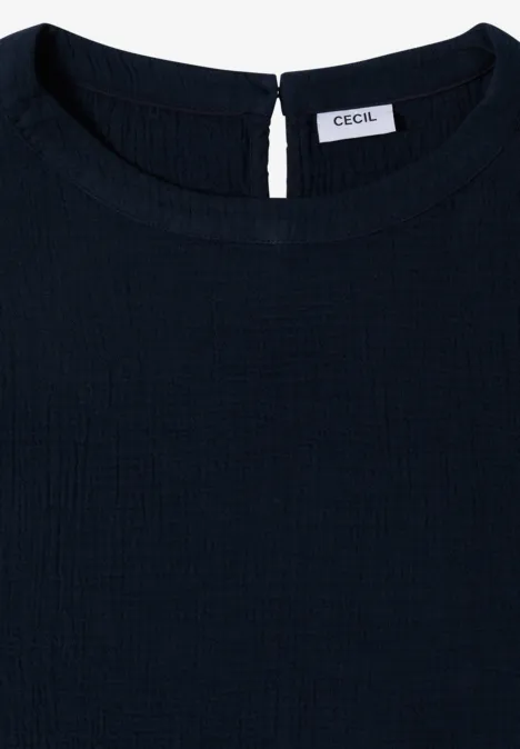 Haut femme bleu marine uni de la marque Cecil, col rond et fermoir à bouton dans le dos.