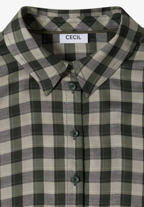 Robe arrivant aux genoux, à petits carreaux khaki Chemise pliée à carreaux verts et gris avec col classique.