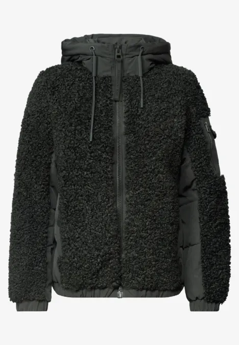 Schwarze Teddy-Fleece-Jacke mit Kapuze und glatten Seiteneinsätzen.