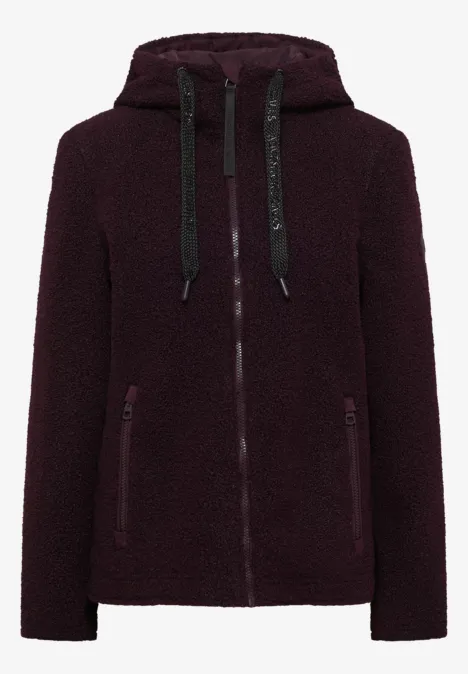 Dunkelrote Teddy-Fleece-Jacke mit Kapuze, Reißverschluss und seitlichen Taschen.