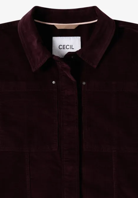 Veste en velours côtelé bordeaux à col, boutons apparents, étiquette 'CECIL' à l'intérieur.