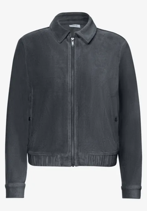 Veste sobre gris foncé avec fermeture éclair centrale, col chemise et bas de veste élastique.