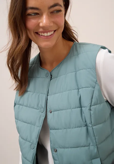 Vest om eronder te dragen ice hill green