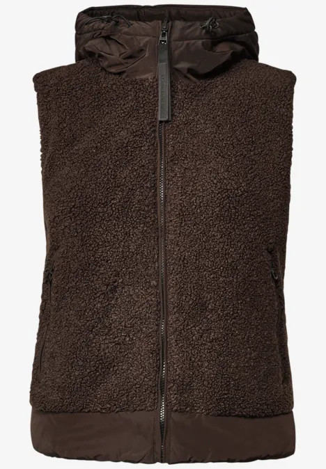 Wendbare Teddyweste in Unifarbe chocolate sauce brown Dunkelbraune, ärmellose Teddyfleece-Weste mit Kapuze, Reißverschluss und seitlichen Taschen.