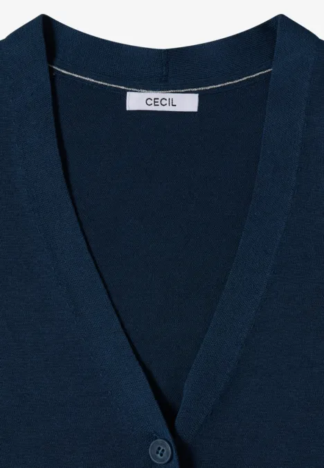 Cardigan mit V-Neck und Knopfleiste moonlight blue Navyblaues Damen-Strickjäckchen mit V-Ausschnitt und Knopfleiste, Markenlabel Cecil am Krageninneren sichtbar.