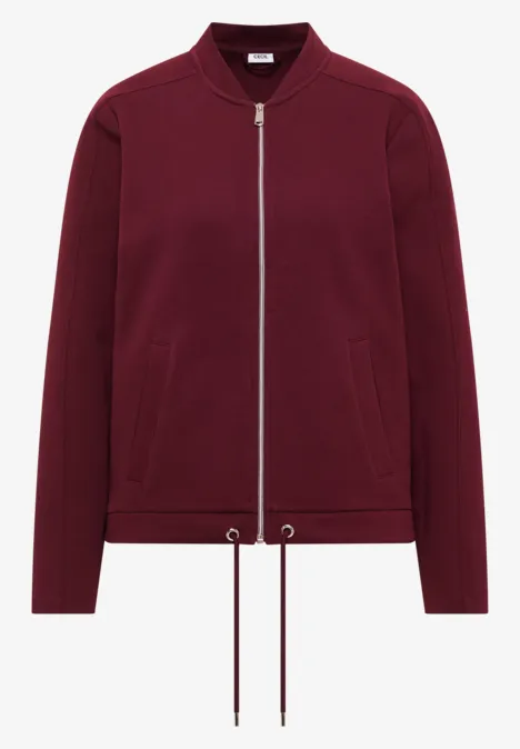 Bordeauxrotes Reißverschluss-Jacke mit Stehkragen und Kordelzug am Saum.
