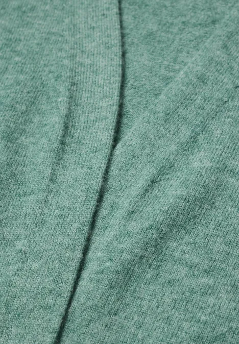 Długi kardigan o luźnym kroju jewel green melange Zielony materiał ze widocznym szwem pośrodku.