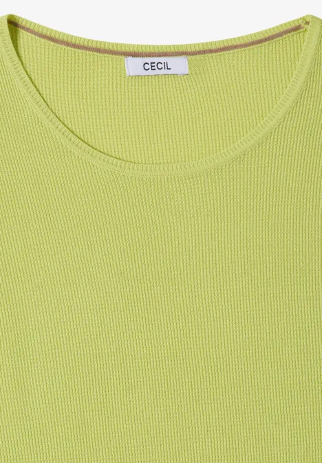 Ärmelloses Top in leuchtendem Lindgrün mit feiner Rippenstruktur und Rundhalsausschnitt, Label 'CECIL' sichtbar.