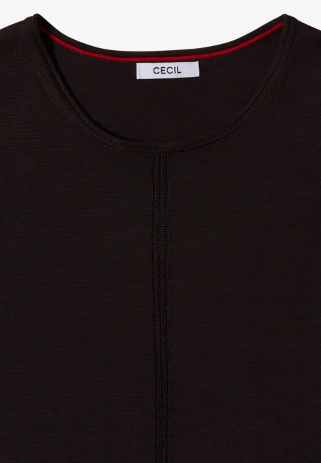 T-shirt noir à manches longues, col rond et couture centrale, design épuré avec étiquette de marque au col.