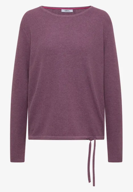 Pull violet à manches longues, encolure ronde et cordon de serrage au bas.