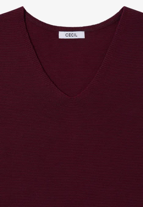 Dunkelrotes Strick-Oberteil mit V-Ausschnitt und CECIL-Label.