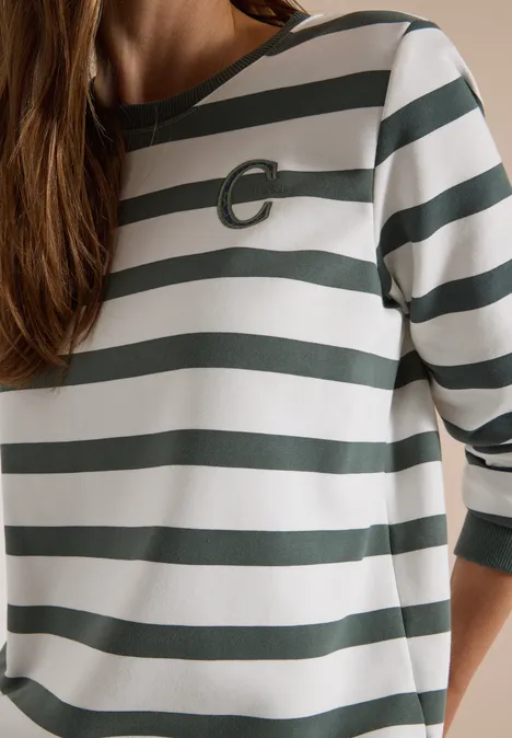 Sweatshirt met ronde hals en trekkoord dried olive green Iemand draagt een wit-groen gestreept 3/4-mouw t-shirt met ronde hals en subtiel C-logo.