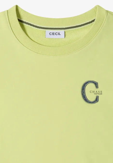 Hellgrünes T-Shirt mit Rundhalsausschnitt, Markenlabel 'CECIL' am Kragen und besticktem 'C Class'-Logo auf der Brust.