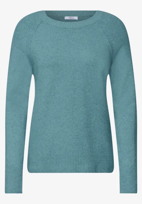 Türkisfarbener, langärmeliger Damenpullover aus Strick.