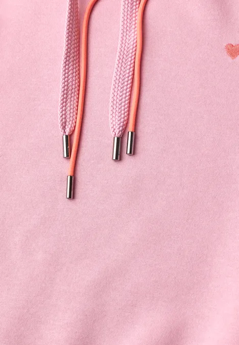 Sweatshirt met lange mouwen en capuchon mellow rose Nahaufnahme eines rosa Sweatshirts mit Kordeln und silbernen Metallenden.