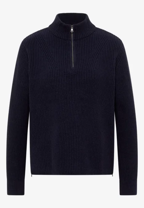 Pull en maille bleu marine à demi-fermeture éclair et texture côtelée.