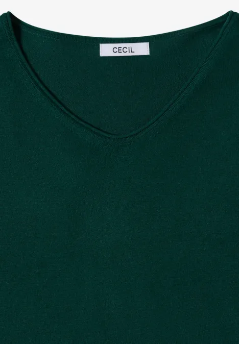 Dunkelgrüner V-Ausschnitt-Pullover mit Label 'CECIL' am Halsausschnitt.
