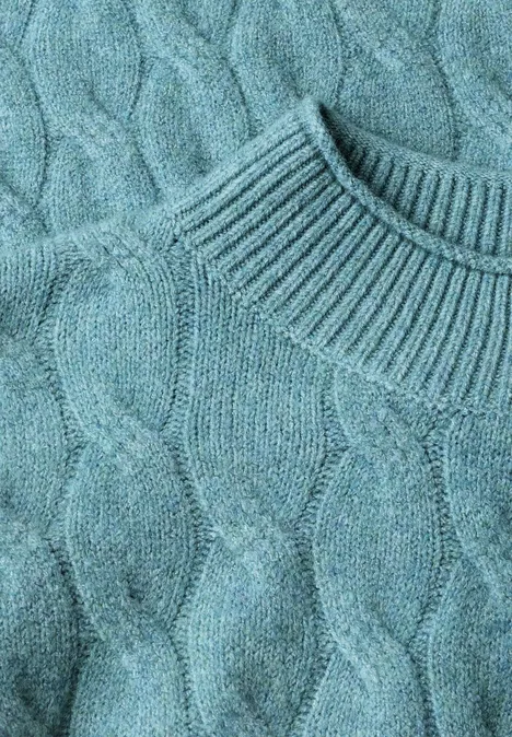 Pull tricoté turquoise à torsades, col montant, doux et confortable.