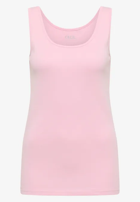 Un haut débardeur rose clair sans manches, en tissu doux, simple et ajusté.