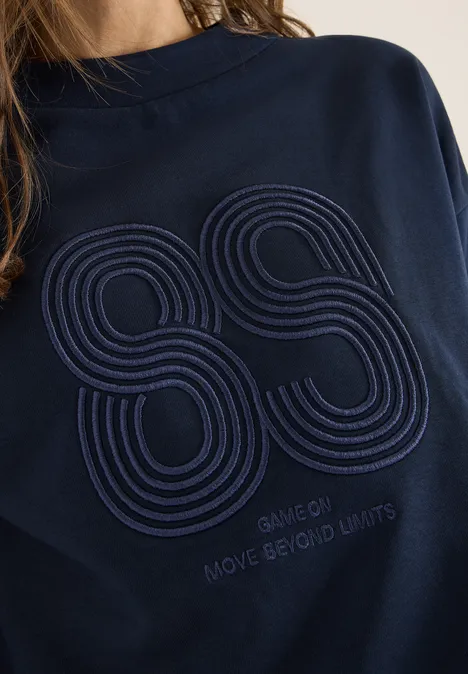 Shirt met borduursel universal blue Shirt met borduursel universal blue