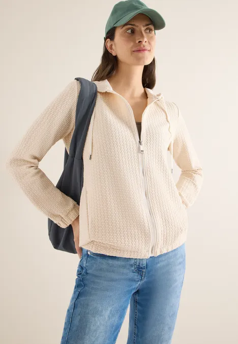 Jas met capuchon en structuur pearl beige