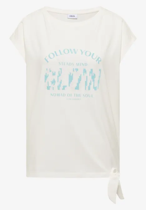 Witte T-shirt met turquoise cactussenprint en zijwaartse knoop.