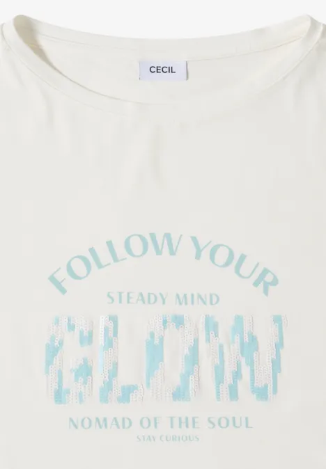Wit T-shirt met opdruk 'FOLLOW YOUR STEADY MIND', pixelgrafiek en tekst 'NOMAD OF THE SOUL'