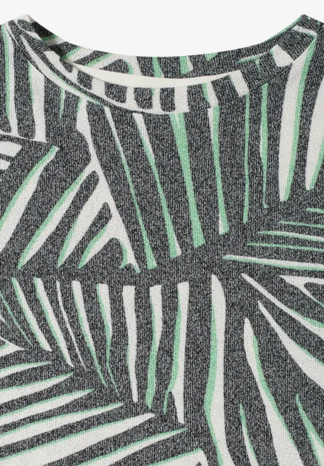 Shirt met boothals en print palm breeze green Mouwloze glittertop in zilver met groen palmbladprint.