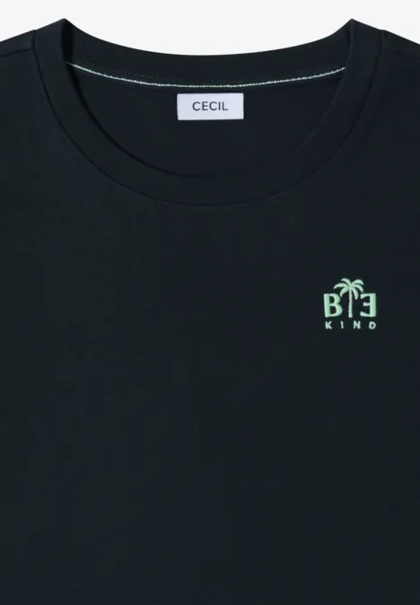 Zwart CECIL crewneck T-shirt met klein groen “BE KIND”-print en palmboom-icoon.
