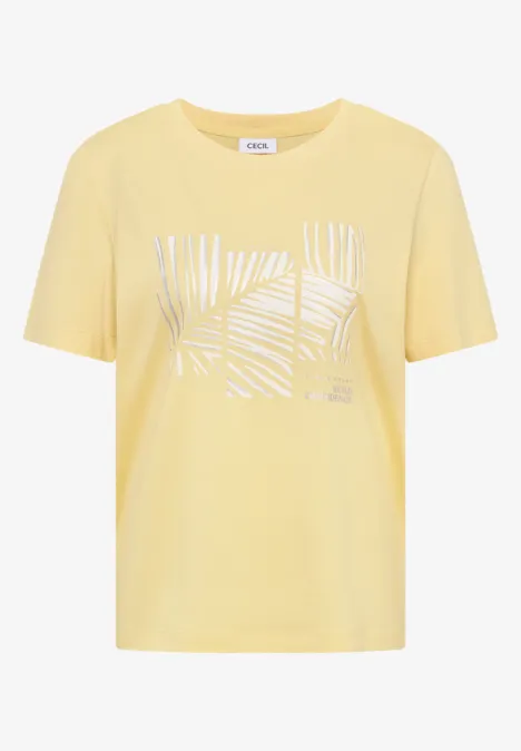 T-shirt jaune clair à manches courtes avec imprimé feuilles de palmier blanc devant.