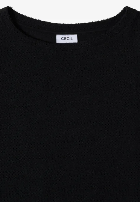 Schwarzer, fein gestrickter Pullover mit Rundhalsausschnitt und Label 'Cecil'.