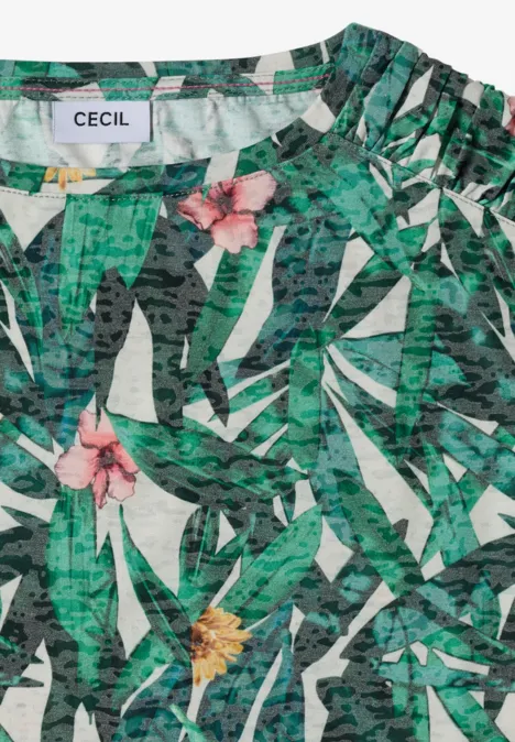 Shirt met burn-out look khaki Mouwloos top met groen bladmotief en roze en gele bloemen.