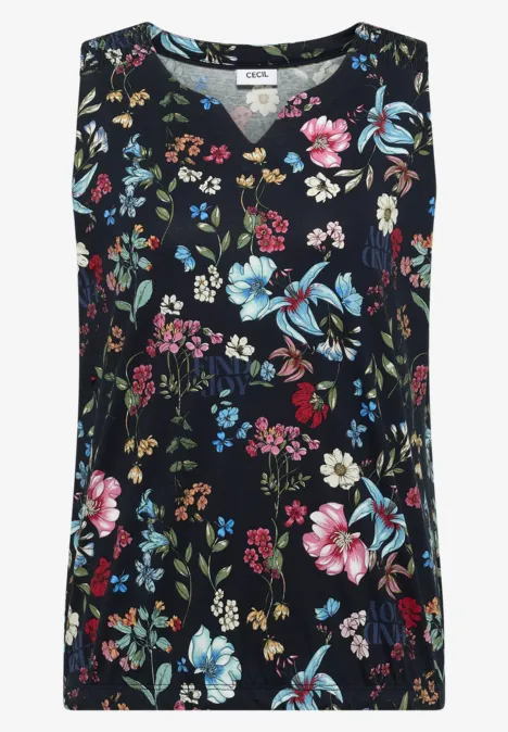 Haut sans manches noir avec imprimé floral multicolore.