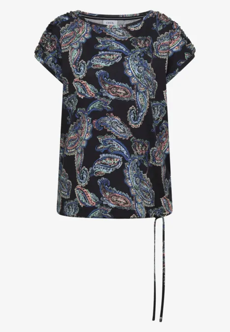 Schwarze Kurzarm-Bluse mit buntem Paisley-Muster und lockerem Schnitt, seitlicher Kordelzug am Saum.