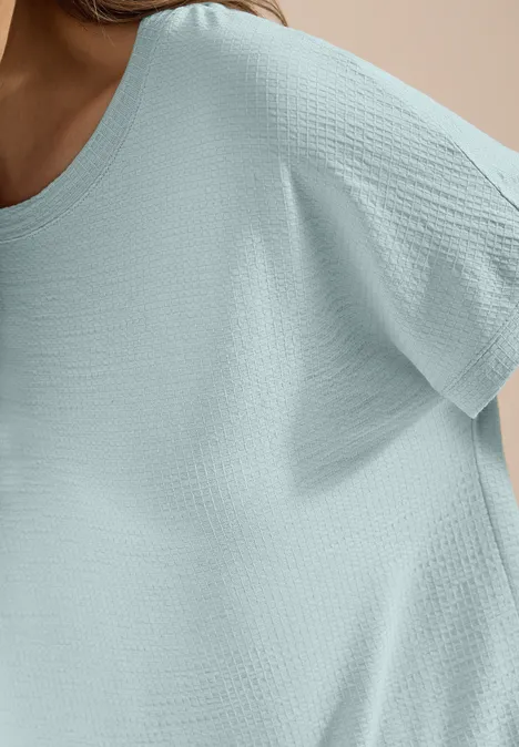 T-Shirt mit Rundhals und Struktur crystal mint Nahaufnahme eines hellgrünen, locker sitzenden Oberteils ohne sichtbares Gesicht