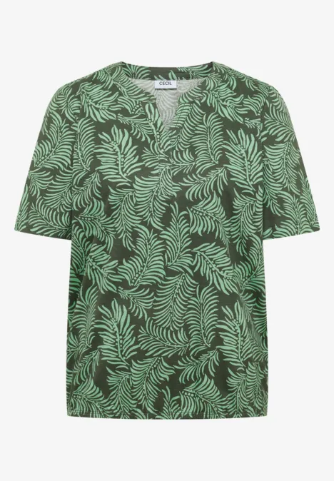 T-shirt vert à manches courtes avec motif de feuilles vert clair.