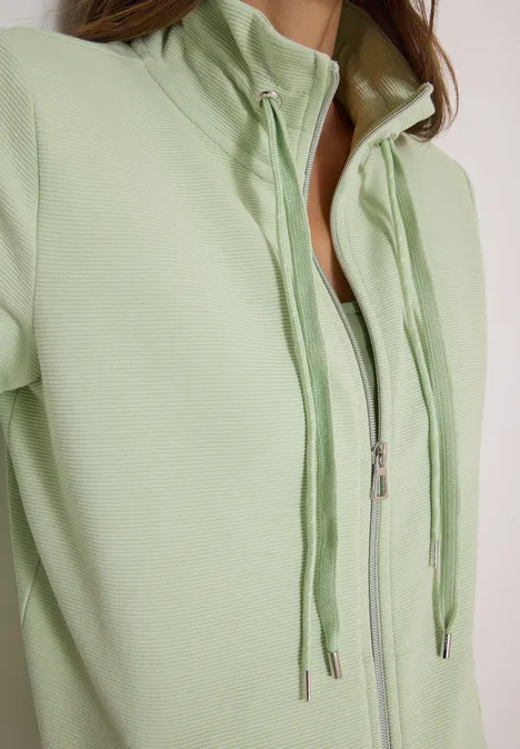 Hellgrüner Hoodie mit halbem Reißverschluss und Kordelzug am Stehkragen, schmale Passform