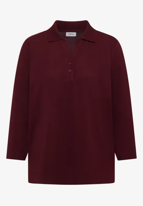 Bordeauxrotes Langarm-Poloshirt mit Kragen und Knopfleiste.