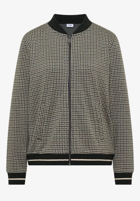Leichte Bomberjacke mit Hahnentritt-Muster, schwarzen Rippbündchen und durchgehendem Reißverschluss.
