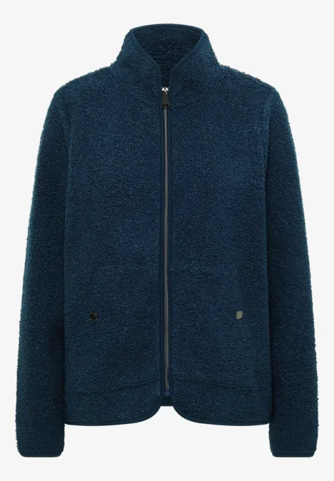 Navyblauer Teddy-Fleece-Blouson mit Stehkragen, Reißverschluss und zwei aufgesetzten Taschen.