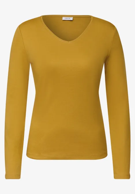 Langarm Shirt in Unifarbe mit V-Neck golden honey Damen-Langarmshirt in senfgelb mit V-Ausschnitt aus weichem Material.