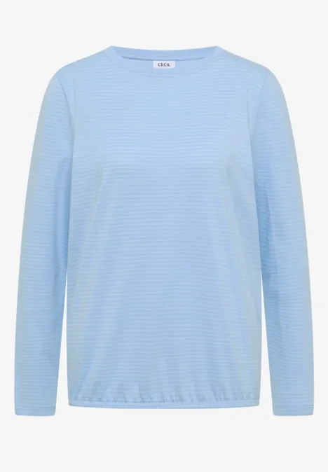 T-shirt à manches longues bleu clair à fines rayures.
