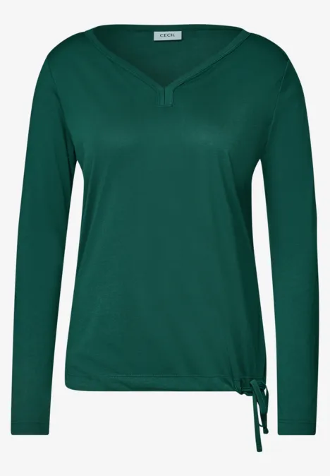 Donker groen damesshirt met V-hals, lange mouwen en zijstrik.