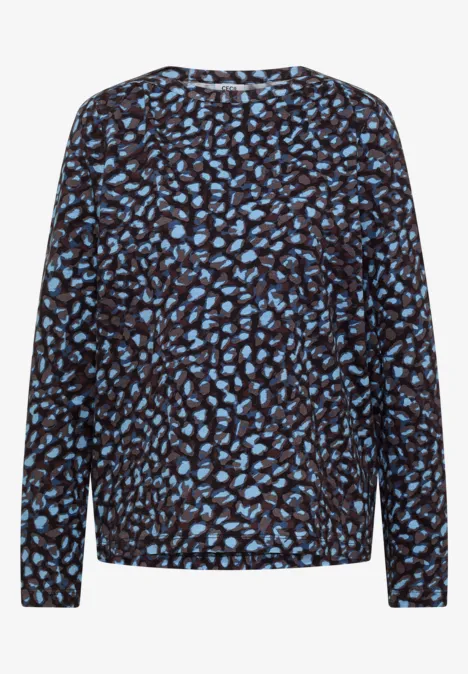 Pull noir à motif de feuilles bleues, manches longues et col rond.