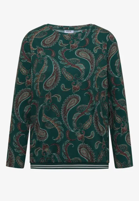 Grünes Langarmshirt mit Paisley-Muster.